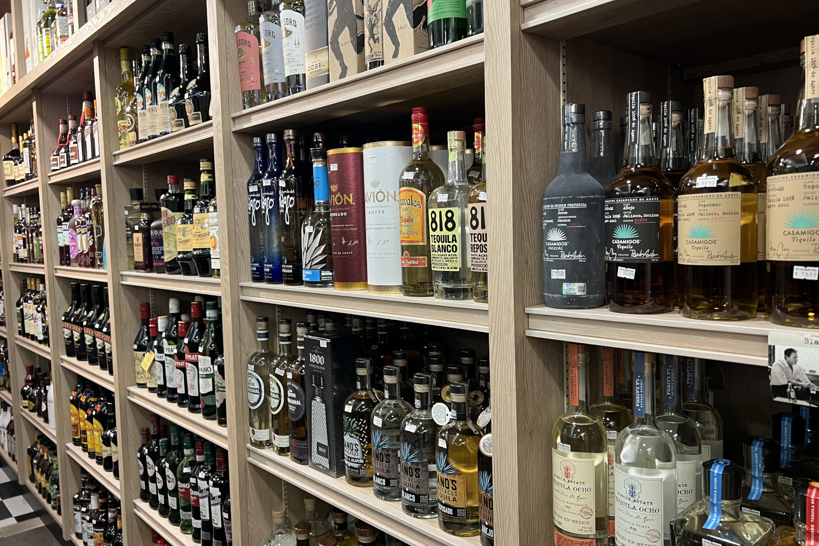 Shelves of specialty spirits in a liquor store