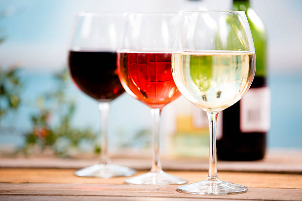 Three wines in wineglasses